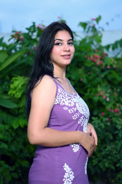 "Flowy sleeveless gown made from soft modal fabric, featuring a minimalist design and elegant drape, ideal for casual or semi-formal occasions."